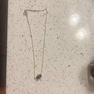 Gold and black Kendra scott necklace